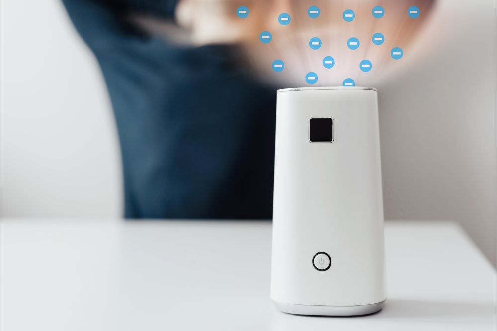 Air Purifier Vs Ionizer 2 White air ionizer stands on the table